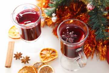 mulled wine with decorated christmas tree