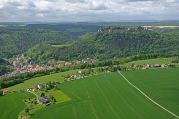 Fototapeta premium Fortress Konigstein from mesa Lilienstein in Saxon Switzerland, Germany