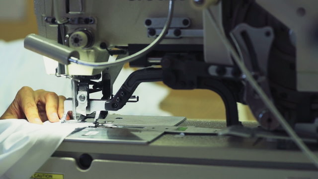 stitching on manufacture sewing machine slow motion
