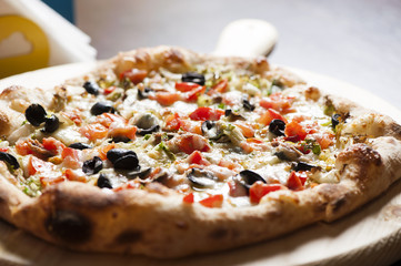 A pizza in a oven burning