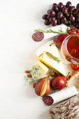 Still life with various types of Italian food and wine