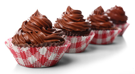 Chocolate cupcakes isolated on white