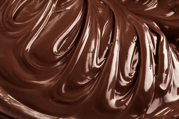 Background of melted milk chocolate, close-up