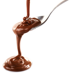 Melted milky brown chocolate pouring from a spoon, isolated on white