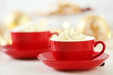 Beautiful composition with cups of cappuccino and Christmas cookies