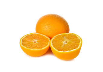 whole and cut ripe orange on white background