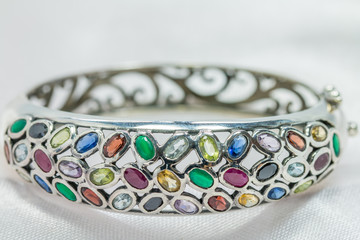 Old silver bangle with gemstone.