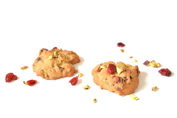 Homemade cranberry and pistachio cookies on white background