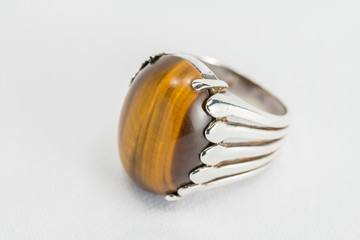 Old silver ring with Tiger's eye gemstone.
