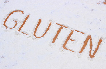 Word gluten written in flour