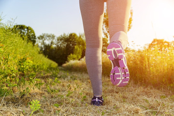 Woman running in a field