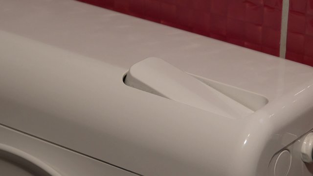 finger pushing button and flushing toilet 