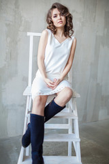 Naklejka premium Beauty woman in white dress