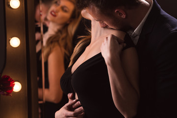 Lovers titillating in erotic pose © Photographee.eu