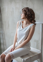 Naklejka premium Beauty woman in white dress