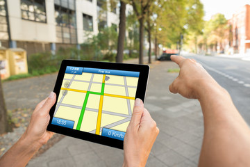 Two People Hands Using Gps Map Navigation