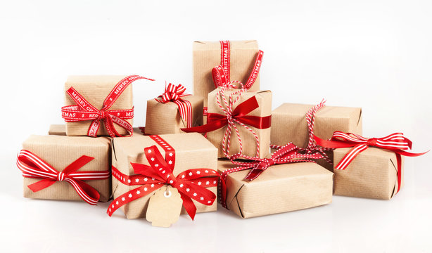 Large stack of decorative Christmas gifts