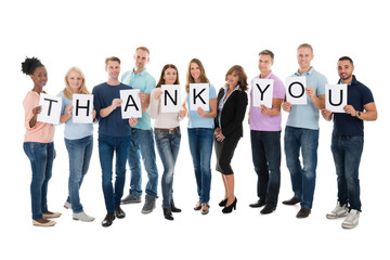 Obraz premium Creative Business People Holding Thank You Sign