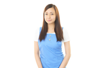Fototapeta premium エプロンを着た女性