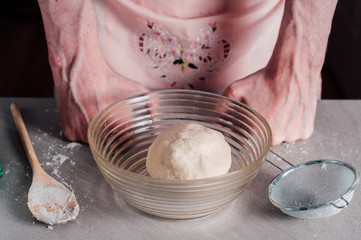 Man making dough for pizza