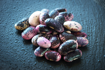 Fresh beans on a black background
