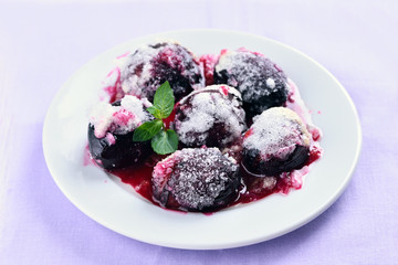 Sugar plums on white plate