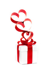 Gift box, bow and heart on a white background