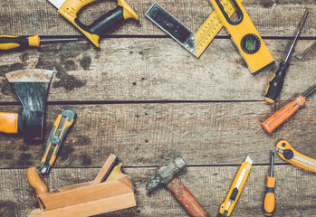 old tools on wooden background