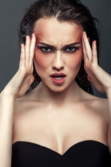 Fototapeta na wymiar Beauty Portrait Of Angry Attractive Woman. Fashion make Up
