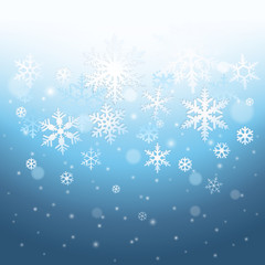 Fototapeta na wymiar Abstract blue winter background with falling snowflakes