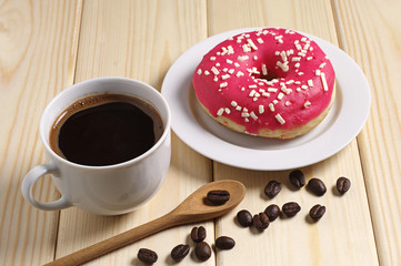 Coffee cup and donut