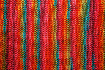 Fototapeta na wymiar Colorful knitting background close up