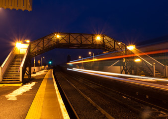 Fototapeta na wymiar Passing train at station north queensferry