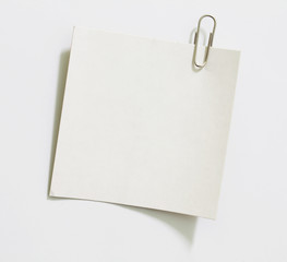 ripped white paper note on white background