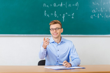 Professor checking students lecture attendance. 