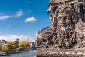 Detail of le Pont Neuf, the oldest bridge in Paris with the Institut de France (French Institute) in the background