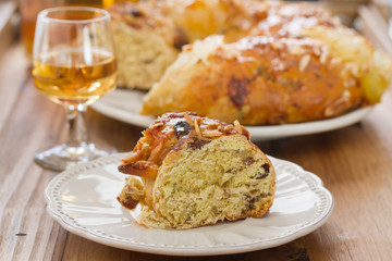Christmas traditional portuguese cake with dry fruits on white plate