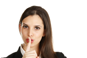 Naklejka premium A woman puts her finger to her mouth as if saying 