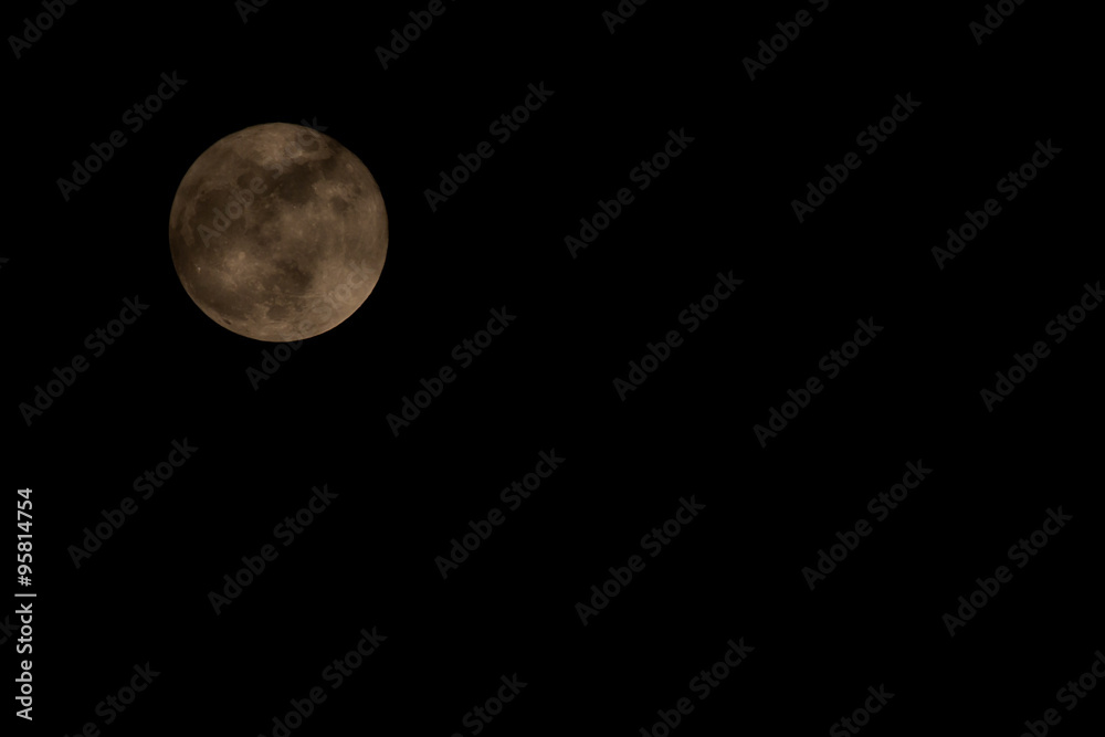 Wall mural Full moon on the black night sky in 28-Sep-2015.