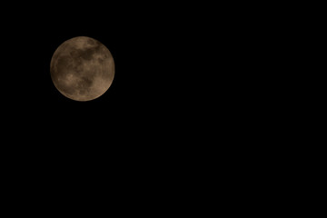 Obraz premium Full moon on the black night sky in 28-Sep-2015.