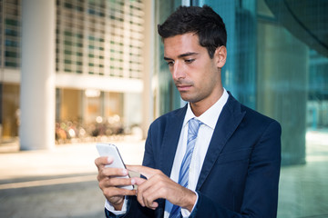 Businessman using his mobile phone