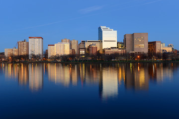 Naklejka premium Boston Massachusetts General Hospital and West End Skyline at night, viewed from Cambridge, Boston, Massachusetts, USA