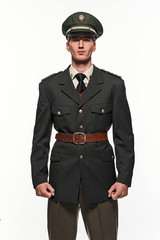 Military uniform fashion man against white background.
