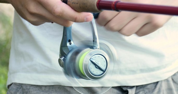 4K - Spinning reel. Close-up