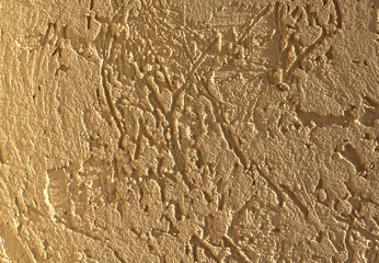 Yellow plaster wall texture