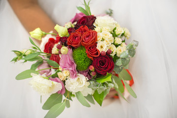 bride holds bouquet