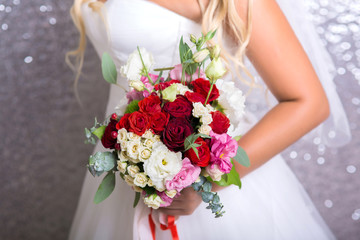 bride holds bouquet