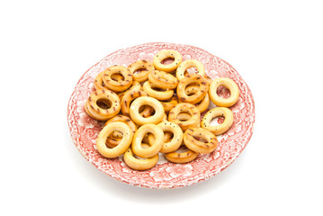 bagels on pink dish on white