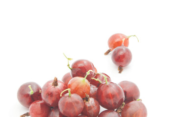 some red gooseberries on white