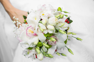 bride holds bouquet